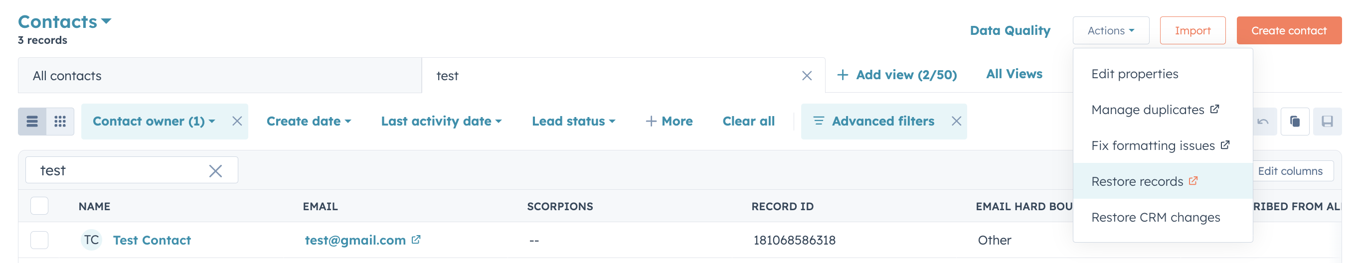 Screenshot showing 'Actions' button and 'Restore Records' option in HubSpot Contacts